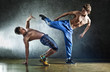 Foto: Two young men sports fighting Two young men sports fighting