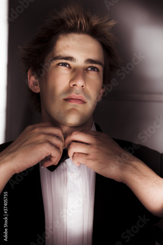 Photo: Man Getting Ready For Black Tie Formal Event Man Getting Ready For Black Tie Formal Event