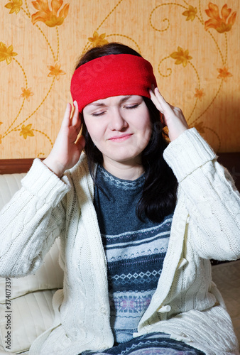 Photo: Woman with pain in her head Woman with pain in her head