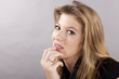 regard de jeune femme pensive la main sur les levres regard de jeune femme pensive la main sur les levres