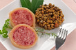 Fette di zampone con lenticchie