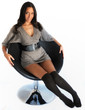 Beautiful woman / model relaxing on a chair