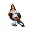 Beautiful woman / model relaxing on a chair