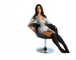 Beautiful woman / model relaxing on a chair
