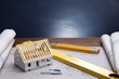 Construction plans and blueprints on wooden table
