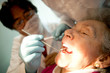 Old woman at the dentist