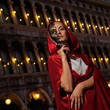 Beautiful woman with a mask outdoor