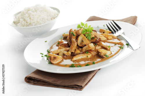 Photo: Schweinegeschnetzeltes mit Champignons und Reis Schweinegeschnetzeltes mit Champignons und Reis