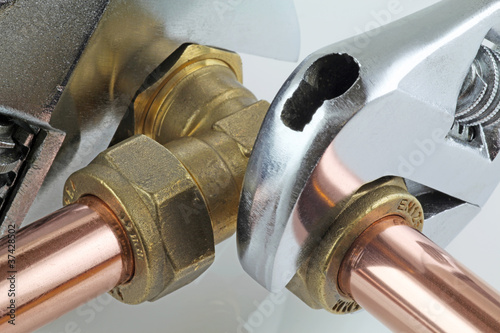 Photo: wrenches on pipework wrenches on pipework