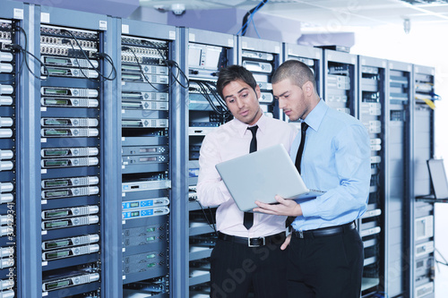 Photo: it enineers in network server room it enineers in network server room