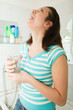 Illness girl gargling throat