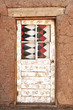 Decorated Door and Adobe Building Decorated Door and Adobe Building