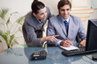 Businesswoman explaining her colleague what he has to do