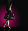 Photo: fashionable woman with a black bag, fashion photo fashionable woman with a black bag, fashion photo