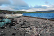 Lonaly boat at abandoned fishing village Hamningberg in Finnmark Lonaly boat at abandoned fishing village Hamningberg in Finnmark