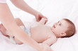 Mother massaging and exercise her little baby Mother massaging and exercise her little baby
