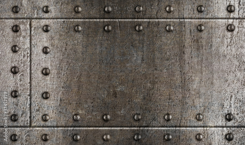Photo: armour metal background with rivets armour metal background with rivets