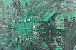 Foto: Modern printed-circuit board macro background Modern printed-circuit board macro background
