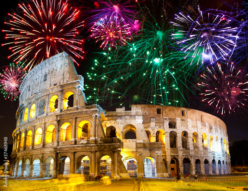 Photo: Celebratory fireworks over Collosseo. Italy. Rome. Celebratory fireworks over Collosseo. Italy. Rome.