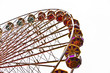 big wheel in motion with dark clouds