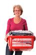 Photo: Hausfrau mit Wäschekorb voll Bügelwäsche.. Hausfrau mit Wäschekorb voll Bügelwäsche..