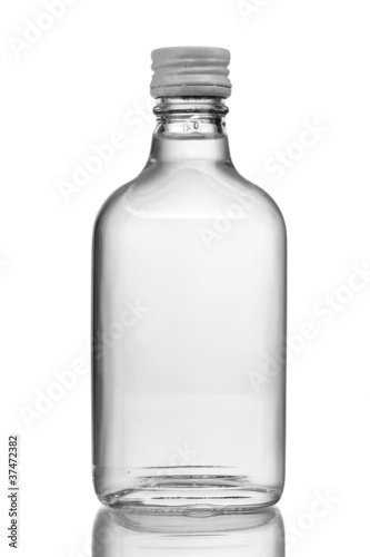 Photo: Bottle of vodka isolated on white Bottle of vodka isolated on white