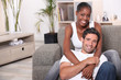 happy mixed couple at home