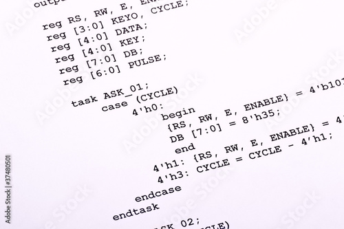 Photo: Part of the computer program is printed on paper Part of the computer program is printed on paper