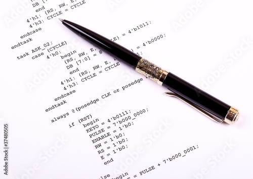 Photo: Part of the computer program and pen Part of the computer program and pen