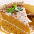Photo: pumpkin pie with mint garnish. pumpkin pie with mint garnish.