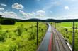 Passing train on a sunny day in austria, motion blur