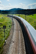 Passing train on a sunny day in austria, motion blur
