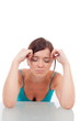 Portrait of a beautiful brunette with migraine