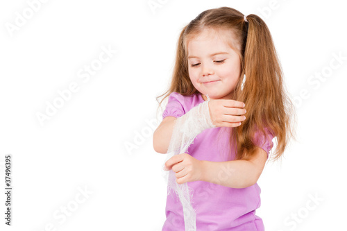 Photo: child's hand with a bandage child's hand with a bandage