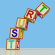 Blocks Spelling Trust Falling Over As Symbol for Lack Of Confide