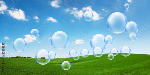 Photo: bubbles over green field bubbles over green field