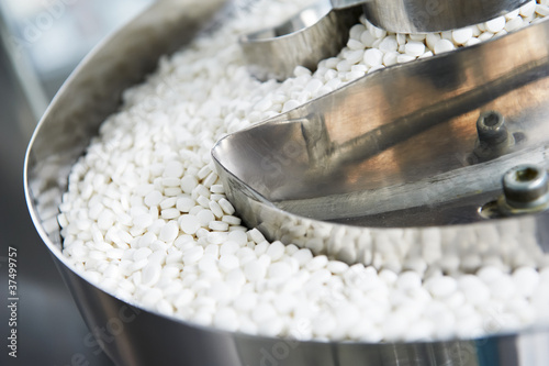 Foto: pharmacy medicine pill production background pharmacy medicine pill production background