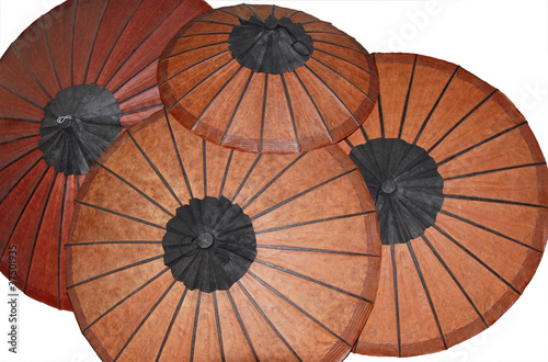 Photo: Asian paper Umbrellas isolated on a white background Asian paper Umbrellas isolated on a white background