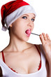 Sexy christmas woman with candy