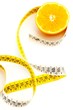 fresh orange with measuring