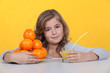 girl drinking fresh orange juice
