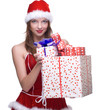 Woman weared in santa clause dress with gifts