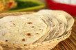 Indian flatbread called chapati in basket Indian flatbread called chapati in basket