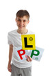 Photo: Teen holding magnetic driving licence plates for car Teen holding magnetic driving licence plates for car