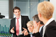 Business - Präsentation in einem Team