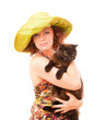redhead in a green straw hat