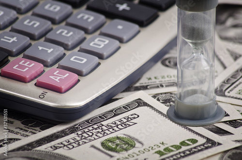 Photo: calculating money and time calculating money and time
