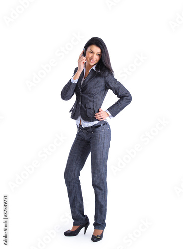 Photo: Confident smart businesswoman on mobile phone call Confident smart businesswoman on mobile phone call