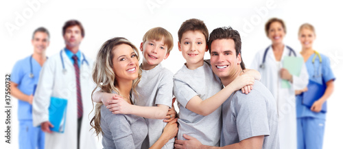 Photo: Medical doctor and happy family patient. Medical doctor and happy family patient.