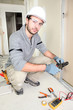 Electrician wiring up new home